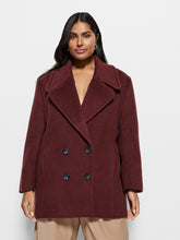 Load image into Gallery viewer, Woman wearing a burgundy coat on a white background
