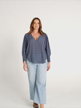 Load and play video in Gallery viewer, The Print V-Neck Blouse
