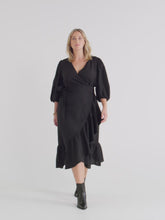 Load and play video in Gallery viewer, The Wrap Ruffle Dress
